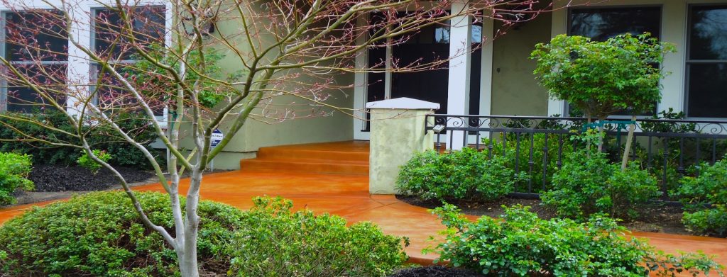 Terra cotta acid-stained concrete porch, steps, and walkway at a North Bay California home — concrete staining services in Santa Rosa CA