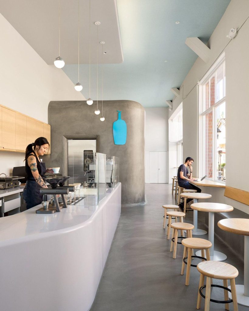 Polymer modified overlay floor in a cafe by J&C Concrete Restorations